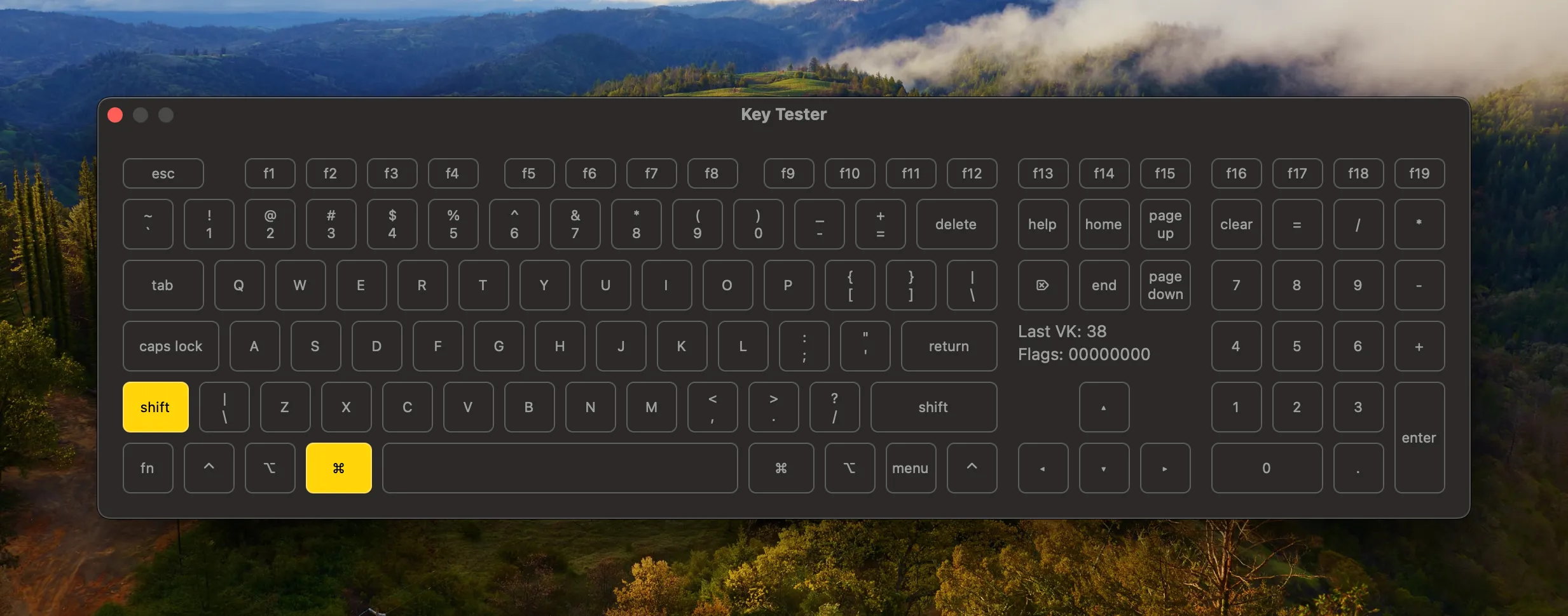 Screenshot of QMK Toolbox Key Tester tool which is a virtual keyboard UI that highlights pressed keys